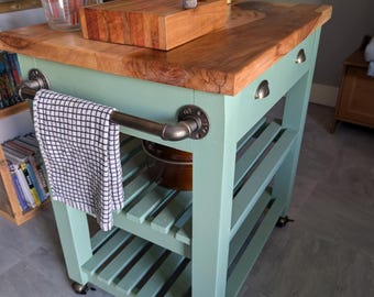 Handcrafted kitchen island with spalted beech butcher’s block top, rustic farmhouse style, custom colour.