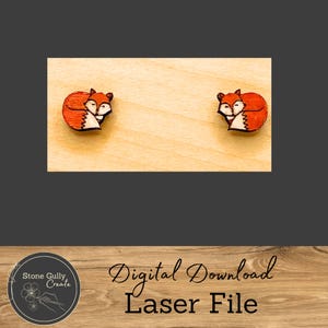 May include: A digital download laser file for a pair of wooden fox earrings. The foxes are curled up and have orange fur with black eyes and noses.