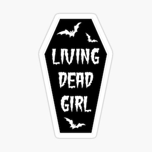 May include: Black and white sticker with a coffin shape and bats. The text "LIVING DEAD GIRL" is inside the coffin.
