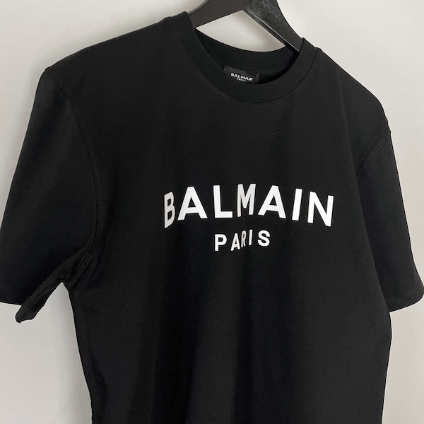 Camiseta Vintage Balmain Negra Con Texto Blanco Talla S
