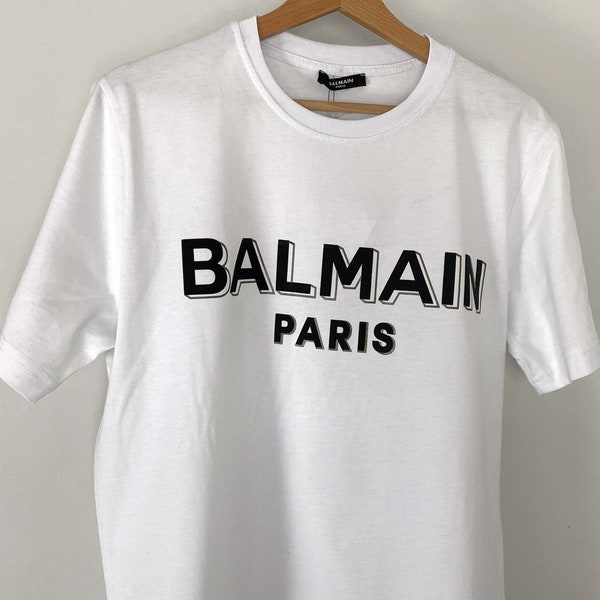 Vintage Balmain White T-shirt With Goldish and Black Text Size L
