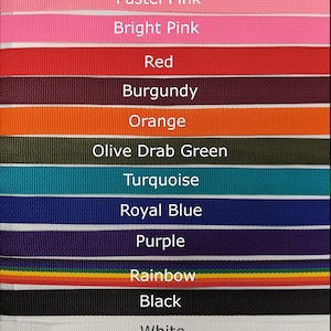 May include: A collection of 12 different colored ribbon straps, including pastel pink, bright pink, red, burgundy, orange, olive drab green, turquoise, royal blue, purple, rainbow, black, and white.