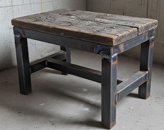 An industrial table that combines raw materials with functionality.