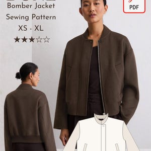 May include: A PDF sewing pattern for a dark brown bomber jacket, labeled DUNE Bomber Jacket Sewing Pattern XS-XL. The image displays the jacket from front and back views, featuring a ribbed collar, cuffs, and a front zipper closure.