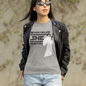 Star Wars Feminist Shirt Princess Leia Tshirt Galaxy Edge Outfit Geeky Gift Women Empowerment Tee Nerdy Pop Culture Blaster Resistance Nevertheless She Resisted Disney World Outfit