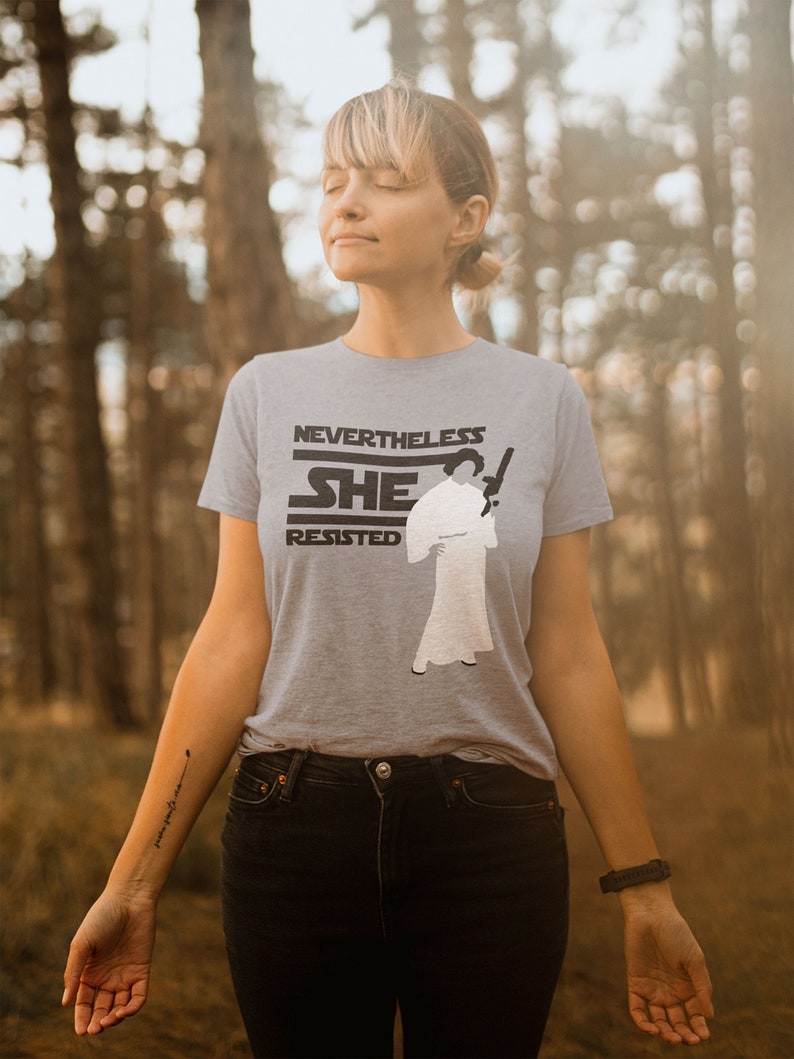 Star Wars Feminist Shirt Princess Leia Tshirt Galaxy Edge Outfit Geeky Gift Women Empowerment Tee Nerdy Pop Culture Blaster Resistance Nevertheless She Resisted Disney World Outfit