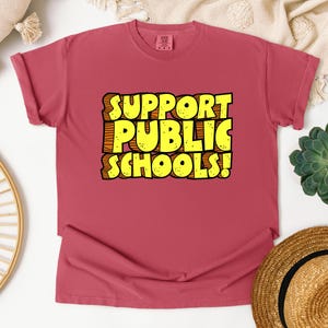 Teacher Gift Shirt Comfort Colors Cotton Education Support Message Rally Protest Wear Teaching Community Unity Statement Public School Advocate Professional Educator Essential Movement Support Quality Construction Soft Material Durable