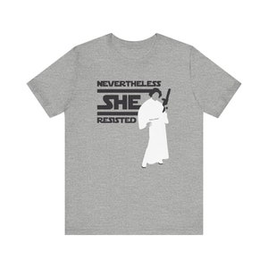 Geeky Feminist Tee Star Wars Inspired Princess Leia Blaster Shirt Nevertheless She Resisted Tshirt Nerdy Pop Culture Feminist Slogan Shirt Comic Con Attire
