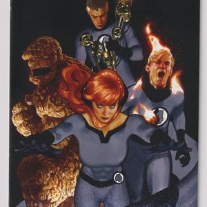 May include: A comic book cover featuring the Fantastic Four. The cover art depicts the four members of the team in their superhero costumes. The characters are standing in a dramatic pose, with the Thing in the foreground. The background is a dark blue and purple color.
