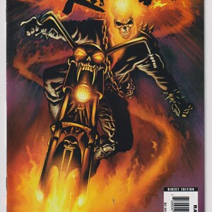 May include: Comic book cover featuring Ghost Rider riding a flaming motorcycle. The character has a flaming skull for a head and is surrounded by flames. The title "Ghost Rider" is in large, fiery letters at the top. The Marvel Comics logo is in the upper left corner.