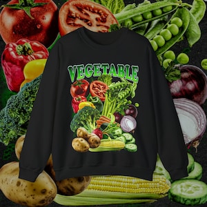 May include: Black sweatshirt with a colorful vegetable graphic and the word "VEGETABLE" in green letters.