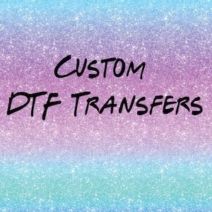 May include: A glittery background transitions from blue to purple to teal. The words "CUSTOM DTF TRANSFERS" are written in a bold, black font across the image. This image is suitable for custom apparel and craft projects.