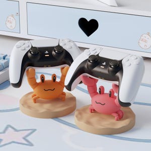 Suporte para controle em formato de caranguejo fofo, ideal para decoração de quarto com tema marítimo, decoração estética para mesa, suporte universal para controle em cores personalizadas e aconchegantes, perfeito para amantes do mar.