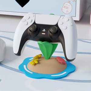 Soporte universal para mandos: temática oceánica con base de isla, estrellas de mar, conchas y hojas. Bonita decoración costera para juegos, ideal para cualquier entorno.