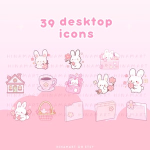 May include: A collection of 39 desktop icons with a cute bunny theme. The icons are in shades of pink and white, featuring bunnies, flowers, a house, a teacup, and folders. Text reads "39 desktop icons".