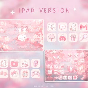 May include: Pink iPad wallpaper and app icon set with a bunny in a cherry blossom scene. The text "IPAD VERSION" is at the top. The app icons include a bunny, tree, popcorn, and more. The lock screen shows the date and time.