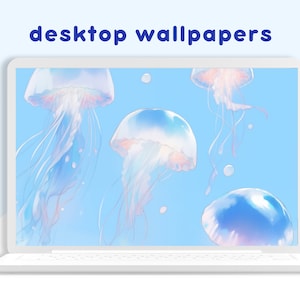 May include: A laptop screen displaying a digital illustration of four jellyfish in a light blue background. The jellyfish are translucent and have a light pink and blue color scheme. The text "desktop wallpapers" is displayed at the top of the screen.