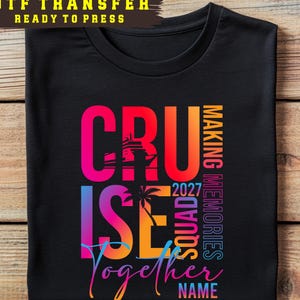 May include: A black t-shirt featuring a colorful gradient graphic with the text CRUISE SQUAD 2027 MAKING MEMORIES Together NAME. The design includes a silhouette of a cruise ship and a palm tree integrated into the bold, multi-colored lettering.