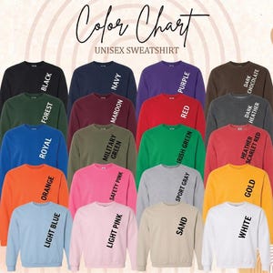 May include: A color chart of unisex sweatshirts in various colors, including black, navy, purple, dark chocolate, forest green, maroon, red, dark heather, royal blue, military green, Irish green, heather scarlet red, orange, safety pink, sport gray, gold, light blue, light pink, sand, and white. The text "Color Chart" and "UNISEX SWEATSHIRT" are displayed.