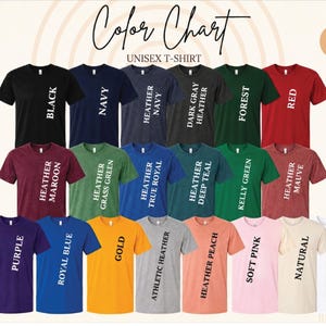 May include: A color chart for unisex t-shirts, showcasing various colors like black, navy, and red. The image displays a range of t-shirts in different hues, including heather, forest, and gold. Text labels identify each color option.