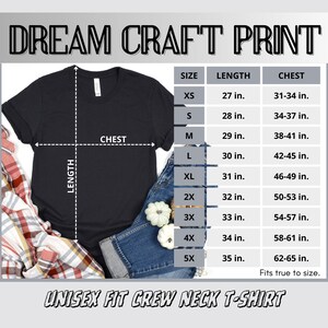 a black t - shirt with the measurements of the shirt