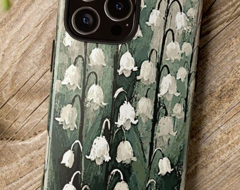 Coque de téléphone illustrée de muguet. Délicates fleurs blanches en forme de clochettes, de style impressionniste, sur un fond de feuilles vertes. Compatible avec de nombreux modèles de téléphones.