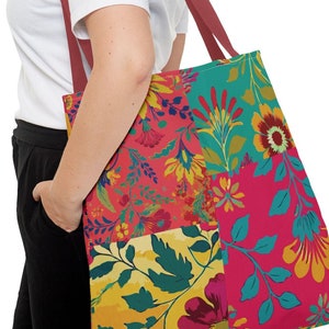 Colorful Floral Patchwork Tote Bag. Featuring a striking patchwork of colorful floral designs in colors such as red, yellow, teal, and pink.