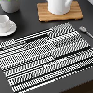 Black and White Lines and Bars Placemat. The clean lines, sharp contrast, and contemporary aesthetic would suit a sleek, modern table.