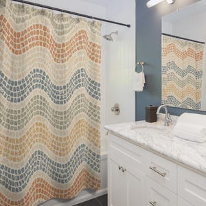 Wavy Mosaic-Inspired Cloth Shower Curtain. Soft, undulating bands of terracotta, dusty blue, sage green, and warm ochre on creamy beige.