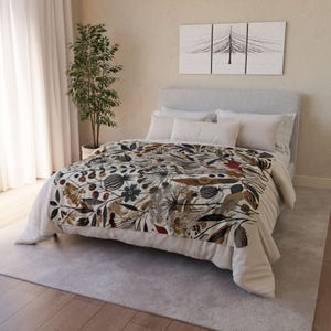 Whimsical Botanical Fleece Sherpa Blanket. Featuring an intricate design of various flowers, leaves, and branches in earthy tones. 2 sizes.