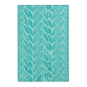 Light Blue Teal Herringbone Area Rug. Featuring a modern, elegant leaf design that forms a herringbone pattern in light blue teal. 3 sizes.