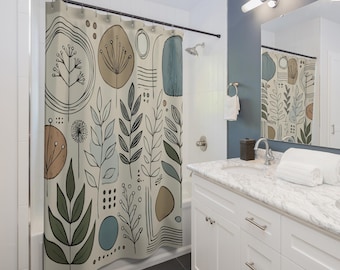 Cortina de ducha minimalista de estilo bohemio. Con elementos botánicos y formas geométricas en azul empolvado, gris topo, ocre cálido y verde suave.