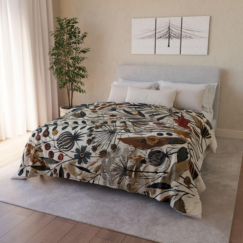 Whimsical Botanical Fleece Sherpa Blanket. Featuring an intricate design of various flowers, leaves, and branches in earthy tones. 2 sizes.