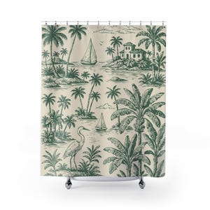 May include: Shower curtain with a tropical island scene in green and beige. The design features palm trees, sailboats, a house, and a bird. The curtain is made of a durable material and is ready to hang.