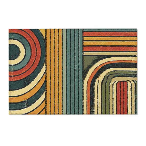 Worn Look Retro Area Rug. Featuring circles and stripes in an earthy color palette of deep orange, mustard yellow, olive green, and teal.
