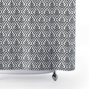 Charcoal Botanical Diamond Shower Curtain. A distressed repeating pattern of diamond shapes, each framing a sketched botanical sprig.