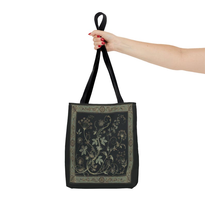 Vintage Inspired Botanical Tote Bag. A tapestry-inspired border frames olive green wildflowers and vines on black. 3 sizes, 2 strap colors.
