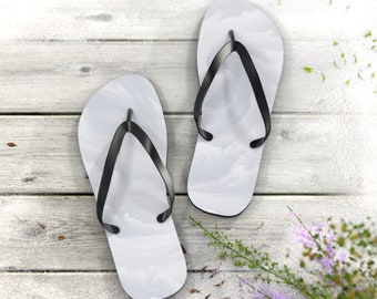 Walk on Air Flip-Flops. Unisex. The ethereal cloud pattern provides a sense of calm and peace, as if walking on a cloud. Perhaps cloud 9.