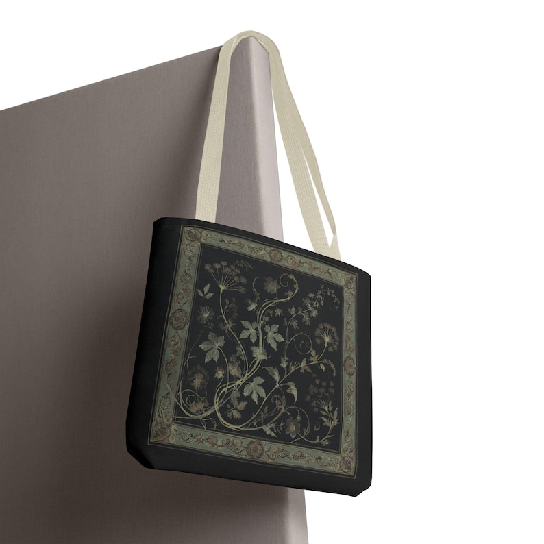 Vintage Inspired Botanical Tote Bag. A tapestry-inspired border frames olive green wildflowers and vines on black. 3 sizes, 2 strap colors.