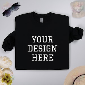 May include: Black long-sleeve t-shirt with the text "YOUR DESIGN HERE" printed in white on the front.