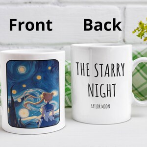 May include: White ceramic mug with a blue and yellow starry night design featuring a cartoon character. The back of the mug reads "The Starry Night Sailor Moon".