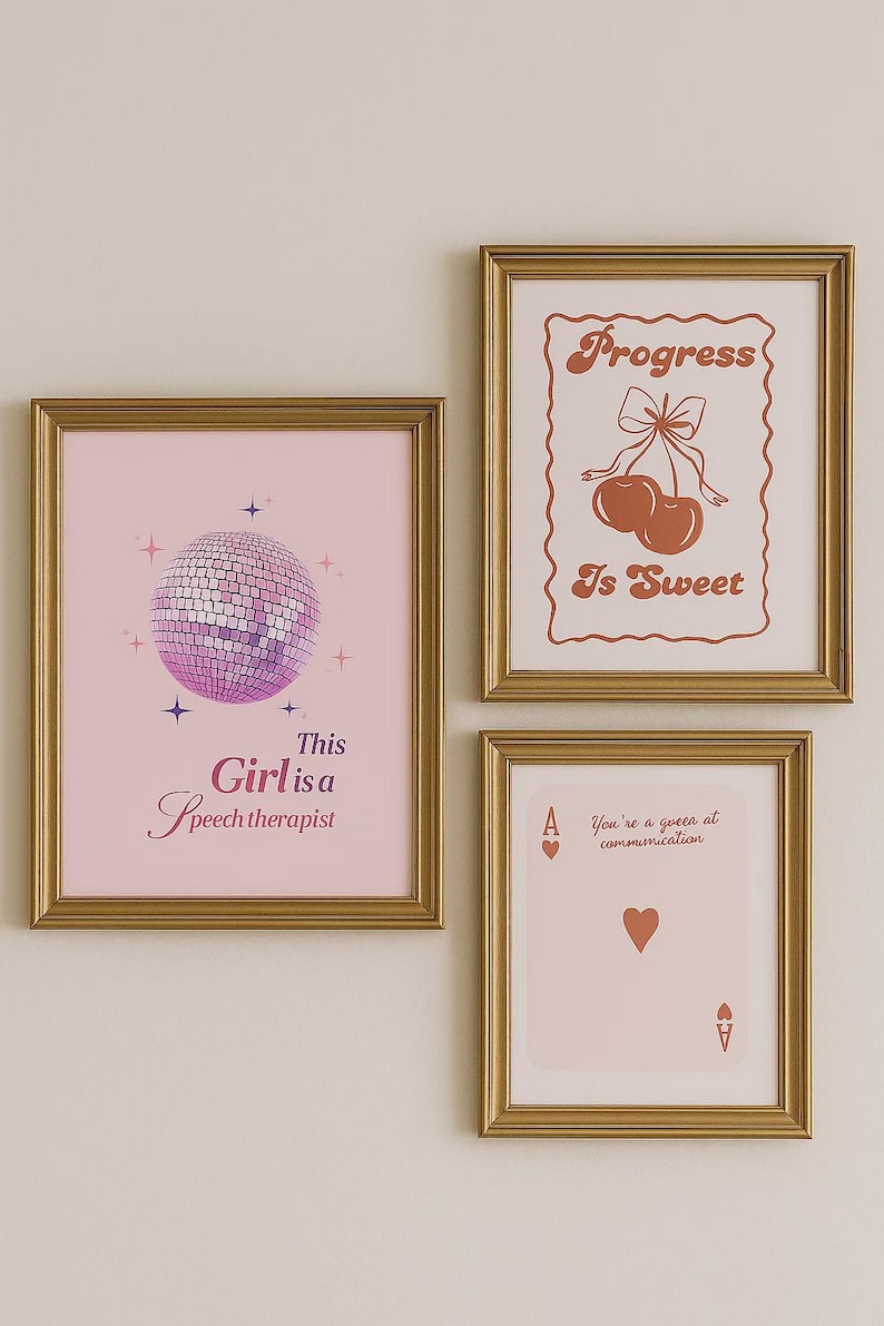 May include: Three framed art prints with gold frames. The prints feature a disco ball, cherries, and a playing card. Text on the prints includes "This Girl is a Speech therapist", "Progress is Sweet", and "You're a queen at communication."