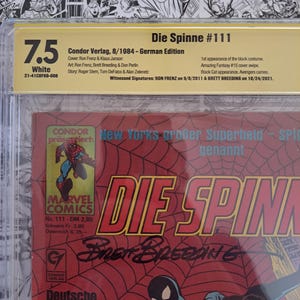May include: A graded comic book titled "Die Spinne #111" from Condor Verlag, 8/1984. The cover features Spider-Man in a black costume, with text in German. The comic is graded 7.5 and has signatures.