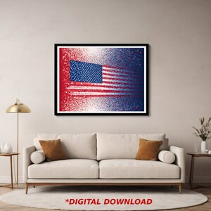 May include: A digital download of a printable art print featuring an abstract American flag design with red, white, and blue colours. The flag is made up of small squares that create a pixelated effect.