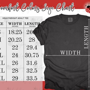 May include: A Comfort Colors size chart for a heavyweight adult tee, featuring a black t-shirt with white arrows indicating width and length measurements in inches. The table lists sizes from S to 4XL with corresponding width and length values.