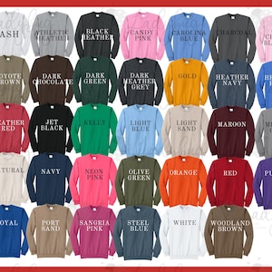 May include: A collection of thirty Port Authority crewneck sweatshirts displayed in a grid, each labeled with its specific color name including ash, athletic heather, black heather, candy pink, carolina blue, charcoal, cherry blossom, and others.