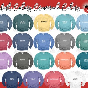 May include: A color chart displaying seventeen crewneck sweatshirts in various shades including blue jean, blue spruce, butter, chalky mint, chambray, crimson, denim, flo blue, grey, light green, orchid, pepper, seafoam, terracotta, topaz blue, true navy, violet, watermelon, and white.