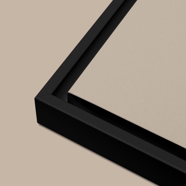 May include: A black framed canvas print with a beige background. The frame is thick and has a smooth finish.