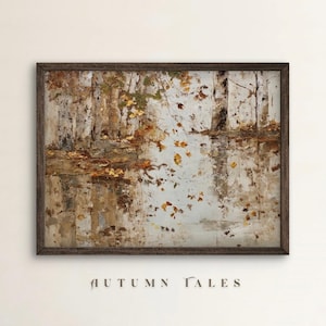 May include: A framed landscape painting depicting a serene autumn scene. The artwork features birch trees reflected in a body of water, with falling leaves in shades of gold and brown. The text "AUTUMN TALES" is at the bottom.