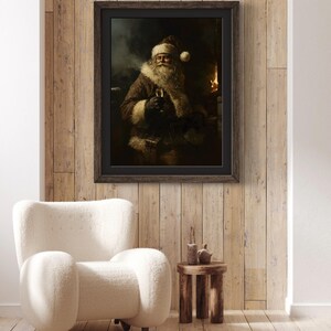 May include: A framed painting of Santa Claus sitting in a chair with a glass of wine in his hand. He is wearing a red hat and a white beard. The painting is set against a dark background with a fireplace in the background.